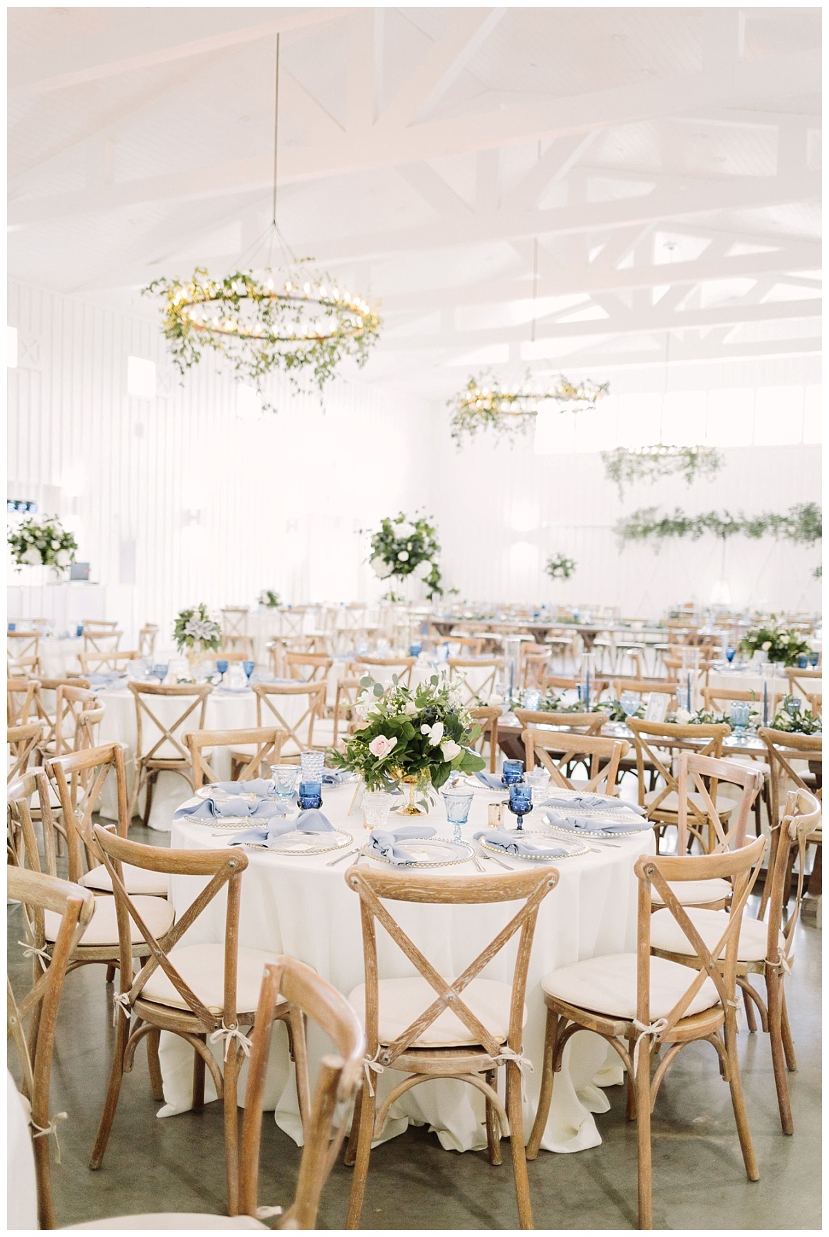 Beautiful view of reception space with tablescapes | The Farmhouse Events Real Weddings| A Little Something Blue| Kelly & Jarrod