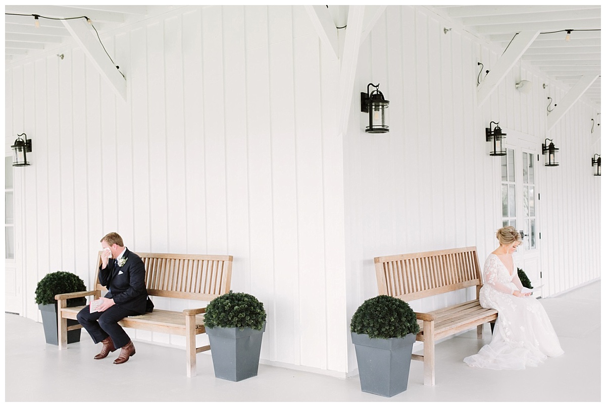 Bride and Groom sitting reading letters | The Farmhouse Events Real Weddings| A Little Something Blue| Kelly & Jarrod